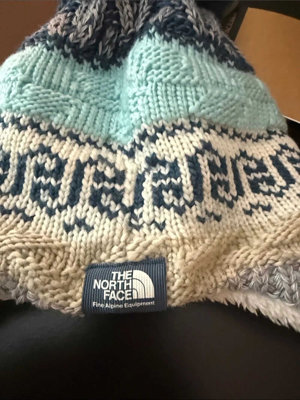 NWT The North Face covered ears beanie pom Pom 0-6 months